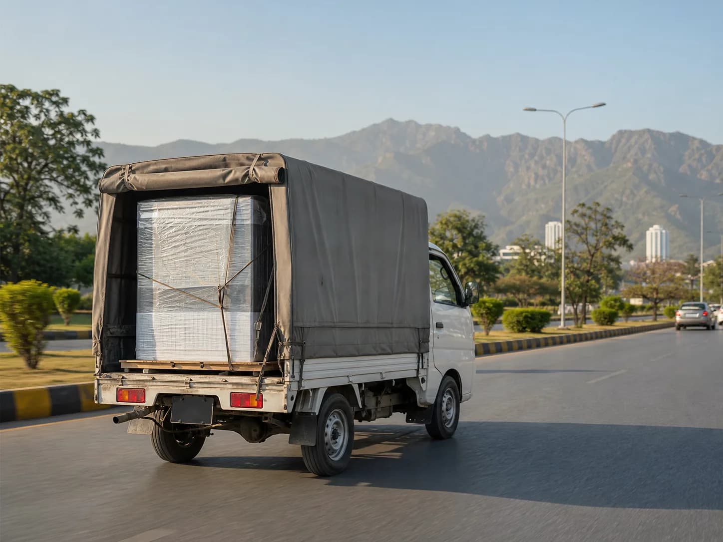 A secured appliance delivery travelling through Islamabad